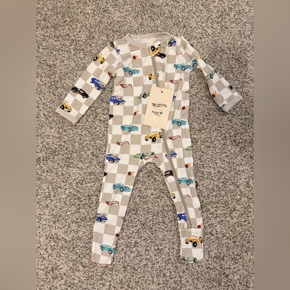 NWT Kyte Baby zippered footie in fast and fierce hotwheels 3-6M